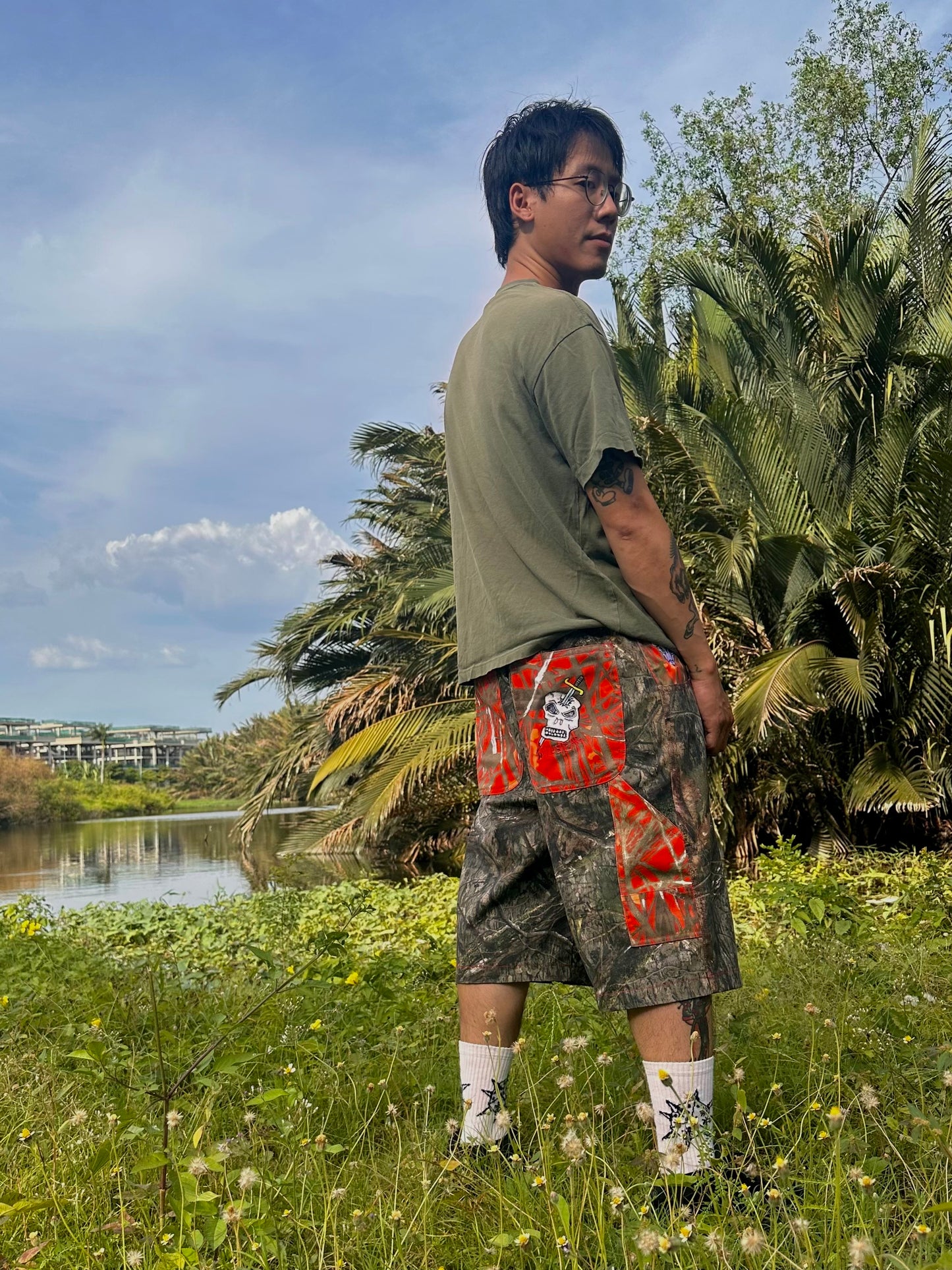 Real Tree / Orange Camo shorts
