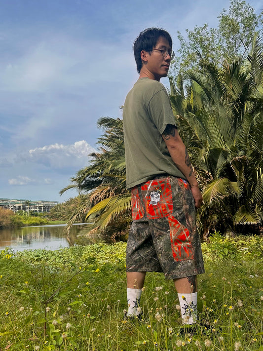 Real Tree / Orange Camo shorts