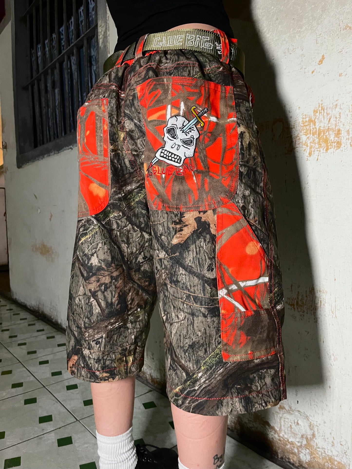 Real Tree / Orange Camo shorts
